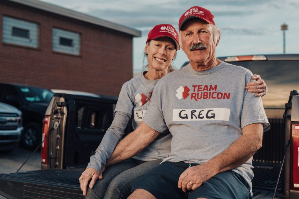 Veteran couple in Team Rubicon shirts